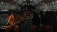 The plane of inmates (Image via YouTube/Apple TV+)